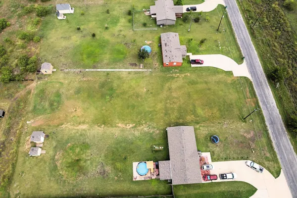 a bathroom with a sink mirror and vanity