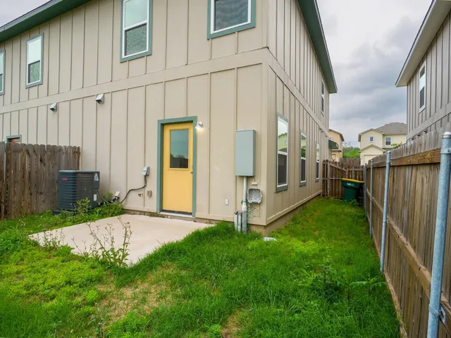 a view of a back yard of the house