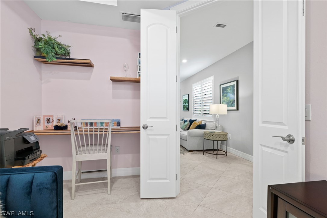 11237 Carlingford Road Fort Myers, FL 33913 - Photo 12 of 38 a living room with furniture and a couch