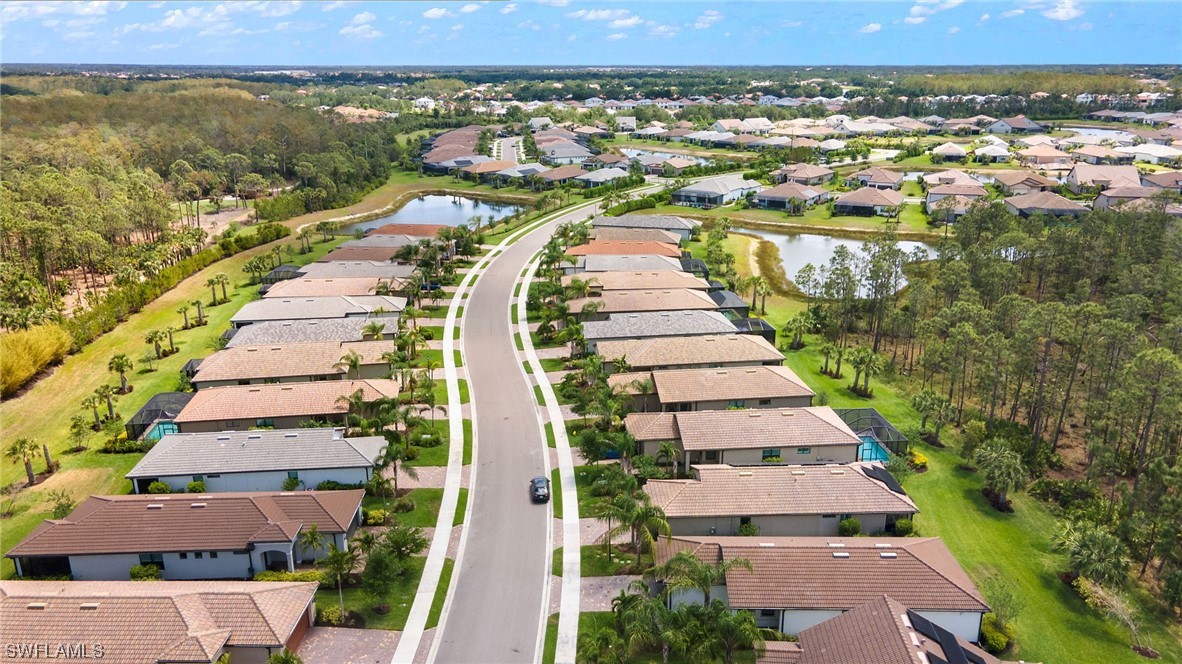 11237 Carlingford Road Fort Myers, FL 33913 - Photo 31 of 38 an aerial view of residential houses with outdoor space