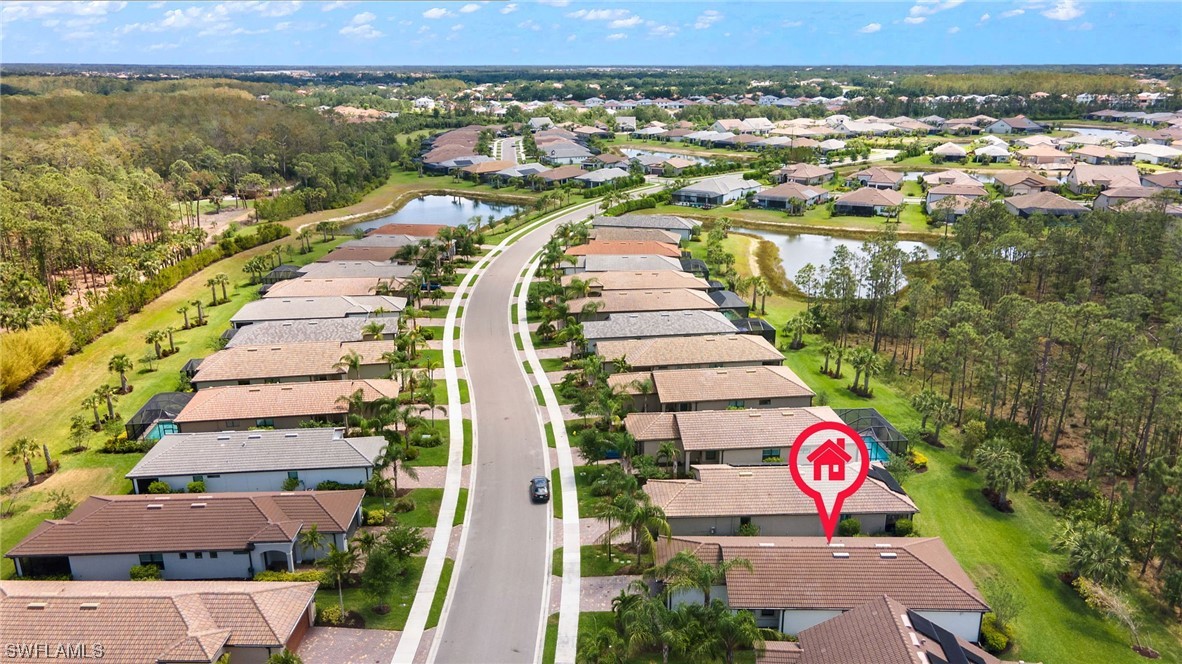 11237 Carlingford Road Fort Myers, FL 33913 - Photo 32 of 38 an aerial view of residential houses with outdoor space and seating