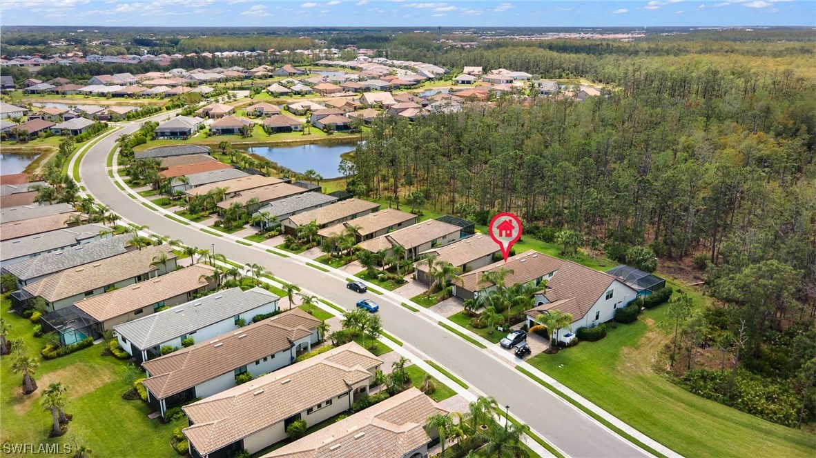 11237 Carlingford Road Fort Myers, FL 33913 - Photo 37 of 38 an aerial view of residential houses with outdoor space