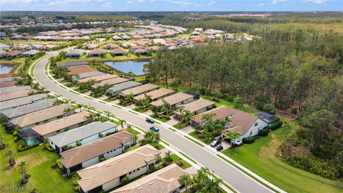 11237 Carlingford Road Fort Myers, FL 33913 - Photo 38 of 38 an aerial view of residential houses with outdoor space
