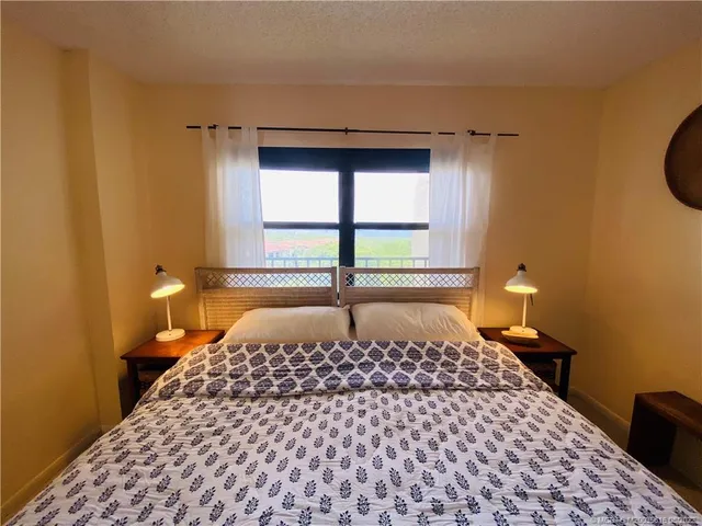 a bathroom with a shower and a toilet