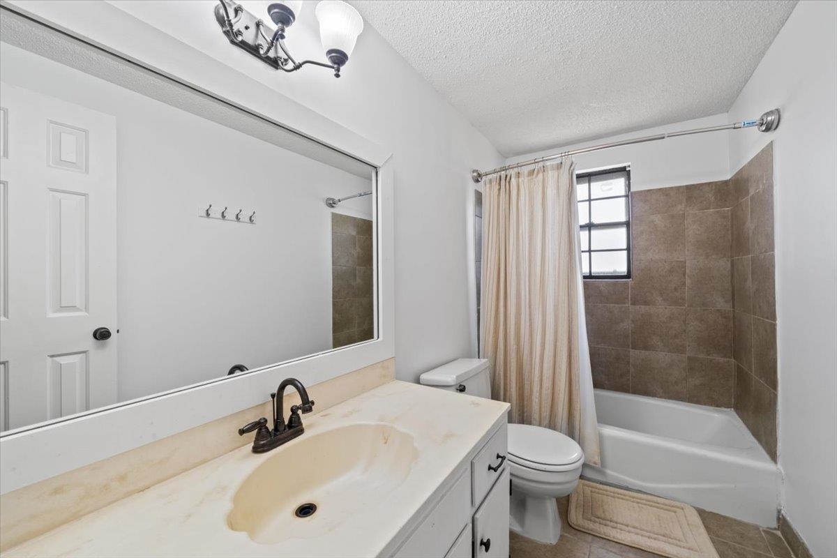 676 Hermitage Trail Collierville, TN 38017 - Photo 11 of 15 a bathroom with a sink a toilet and shower