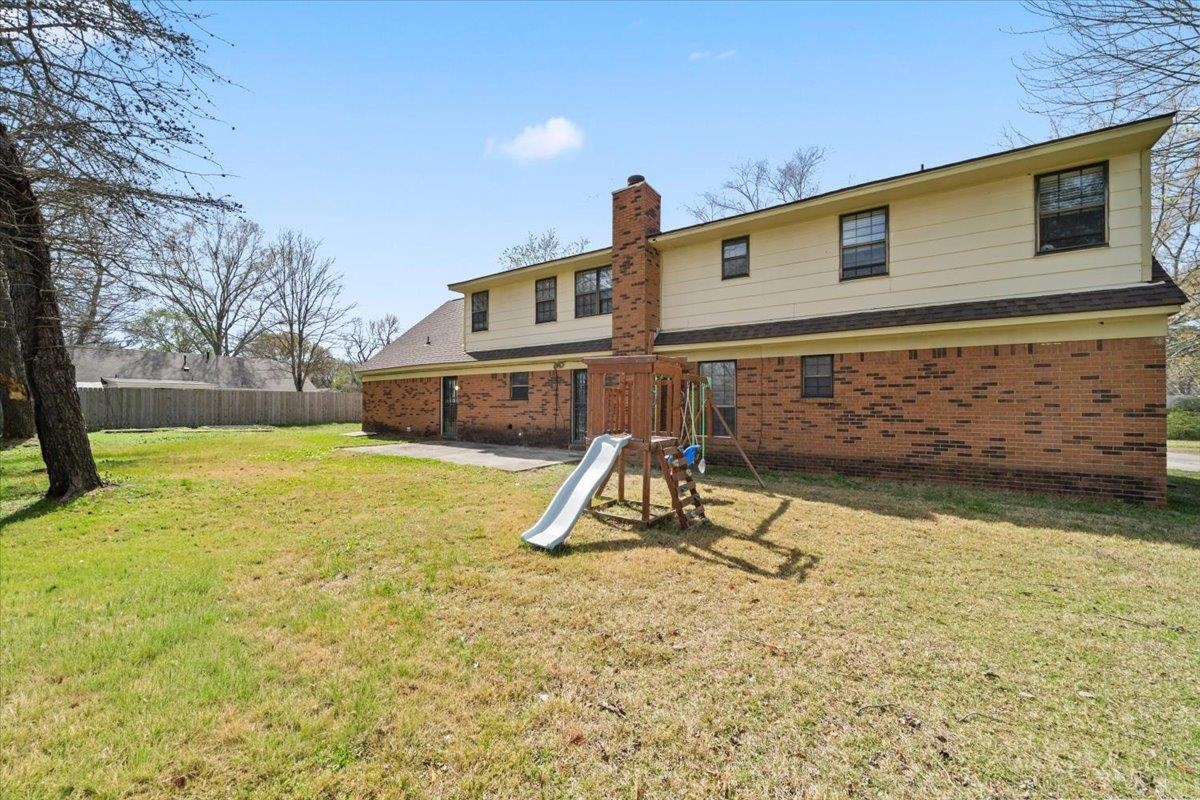 676 Hermitage Trail Collierville, TN 38017 - Photo 15 of 15 a view of a house with a yard