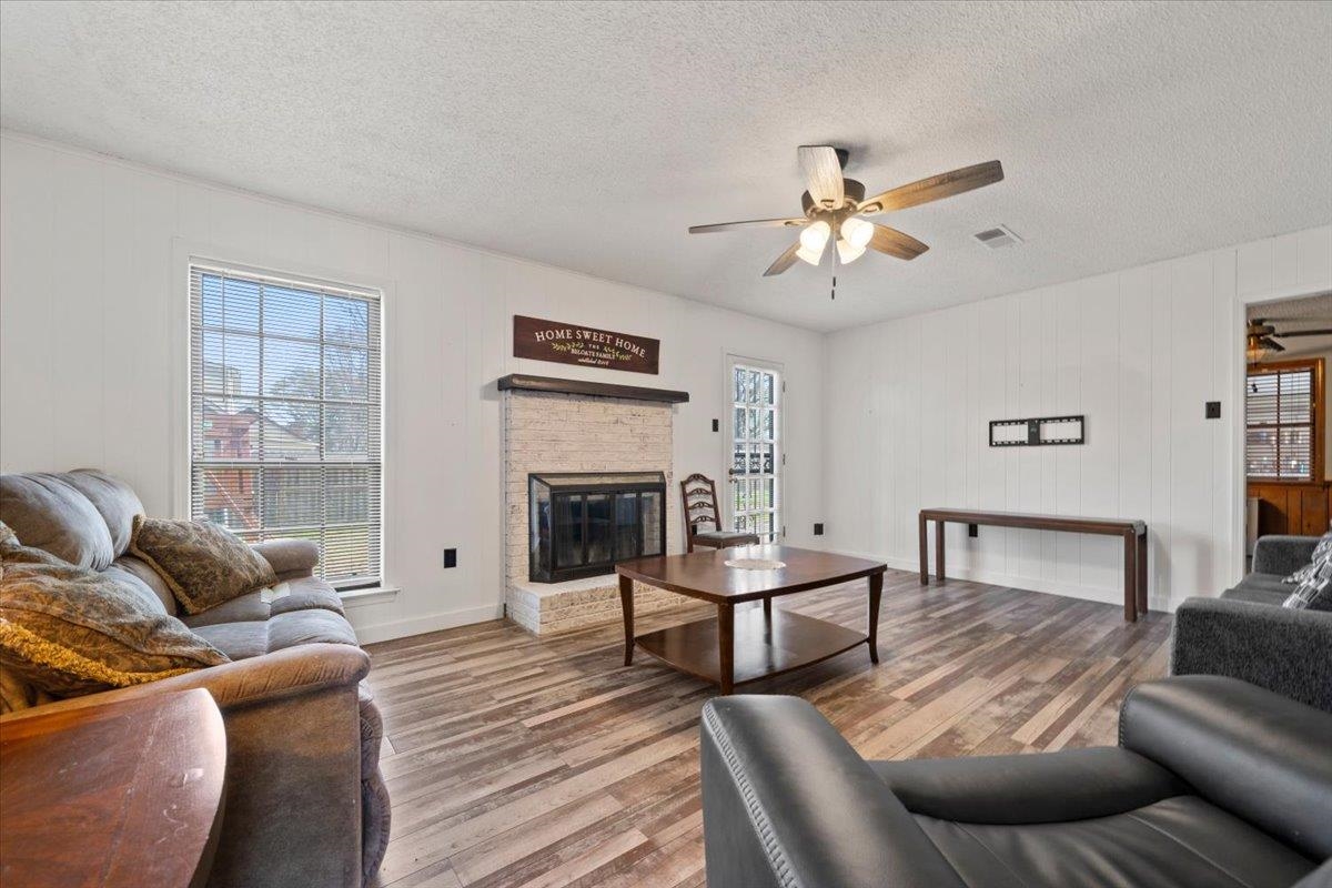 676 Hermitage Trail Collierville, TN 38017 - Photo 3 of 15 a living room with furniture and a fireplace