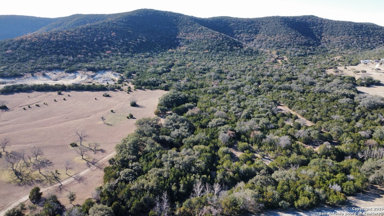 1543 Walter White Ranch Road Leakey, TX 78873 - Photo 3 of 4 a view of houses and mountain view