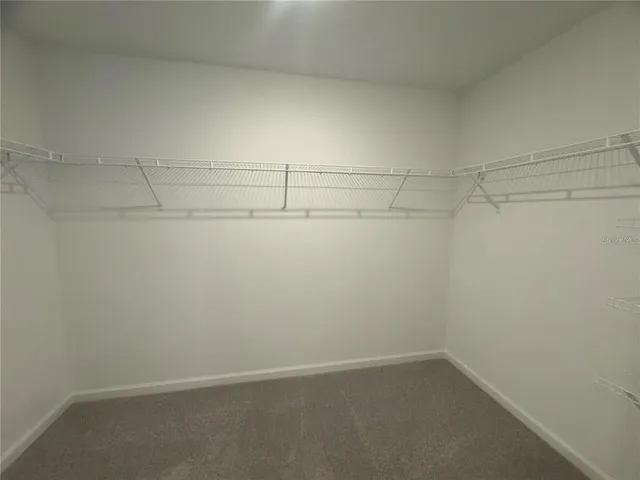 a view of a room with racks on the wall