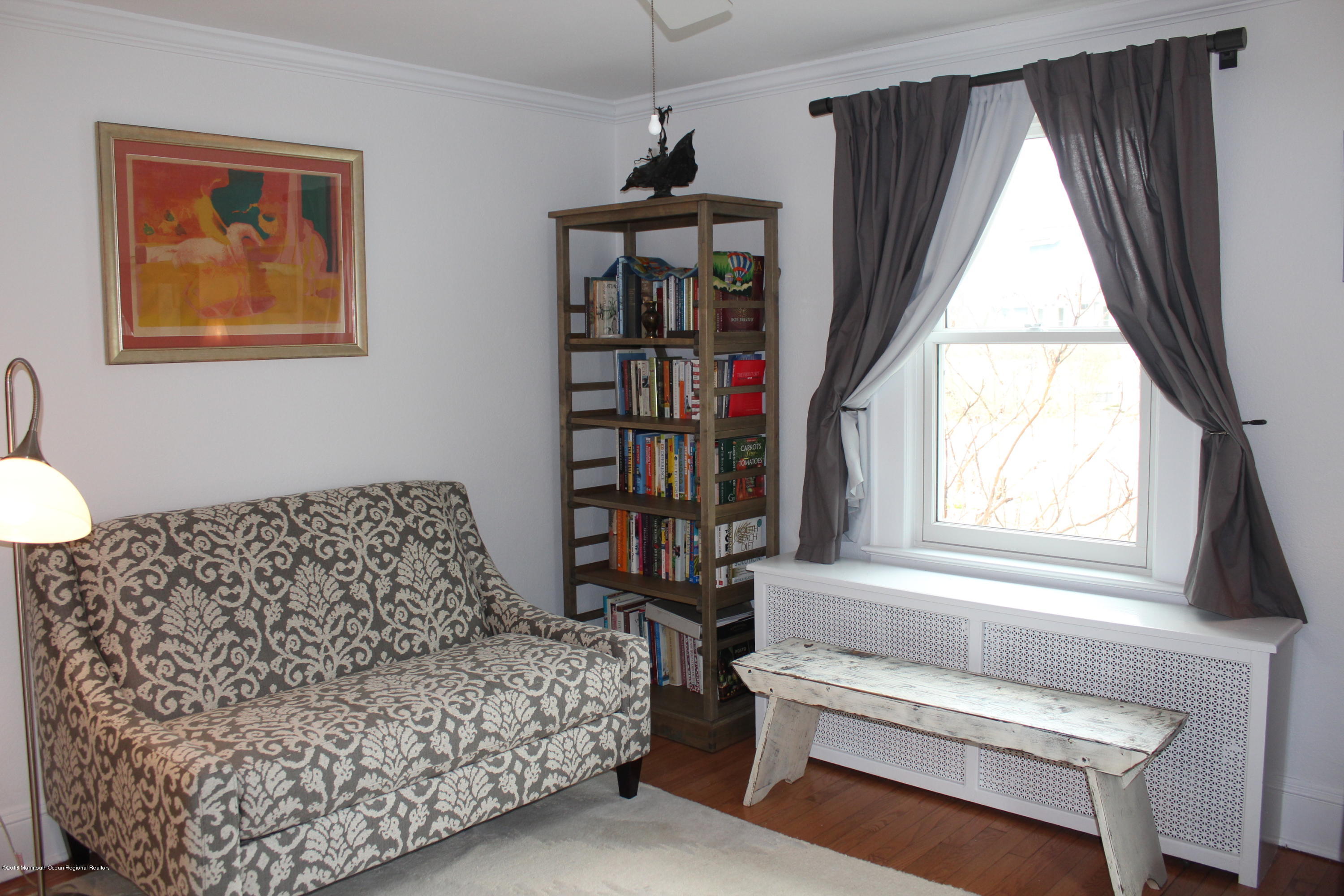 12 Little Silver Point Road Little Silver, NJ 07739 - Photo 15 of 29 a living room with furniture a window and a chandelier