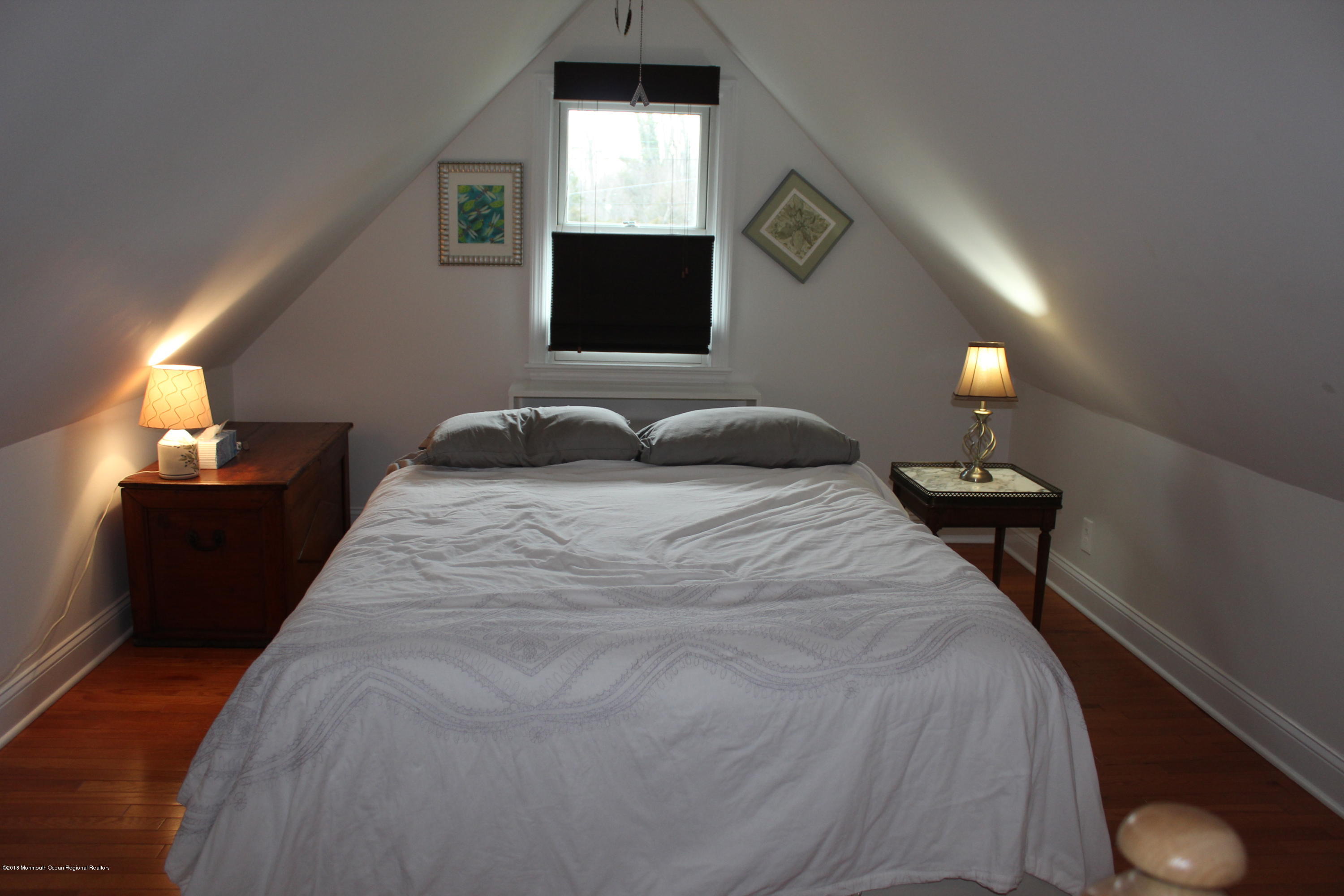 12 Little Silver Point Road Little Silver, NJ 07739 - Photo 16 of 29 a bedroom with a bed and a tv