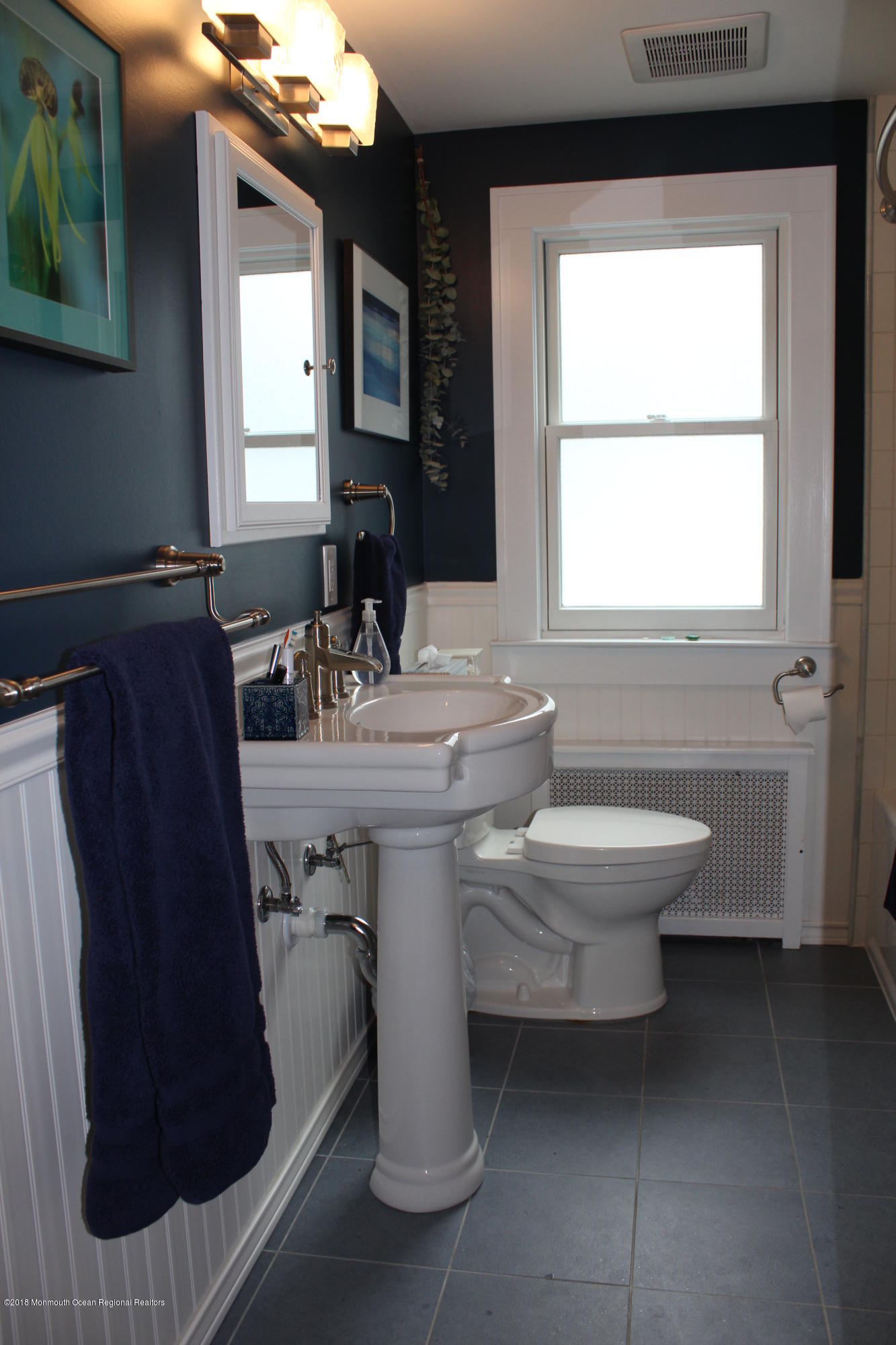 12 Little Silver Point Road Little Silver, NJ 07739 - Photo 17 of 29 a bathroom with a sink toilet and mirror