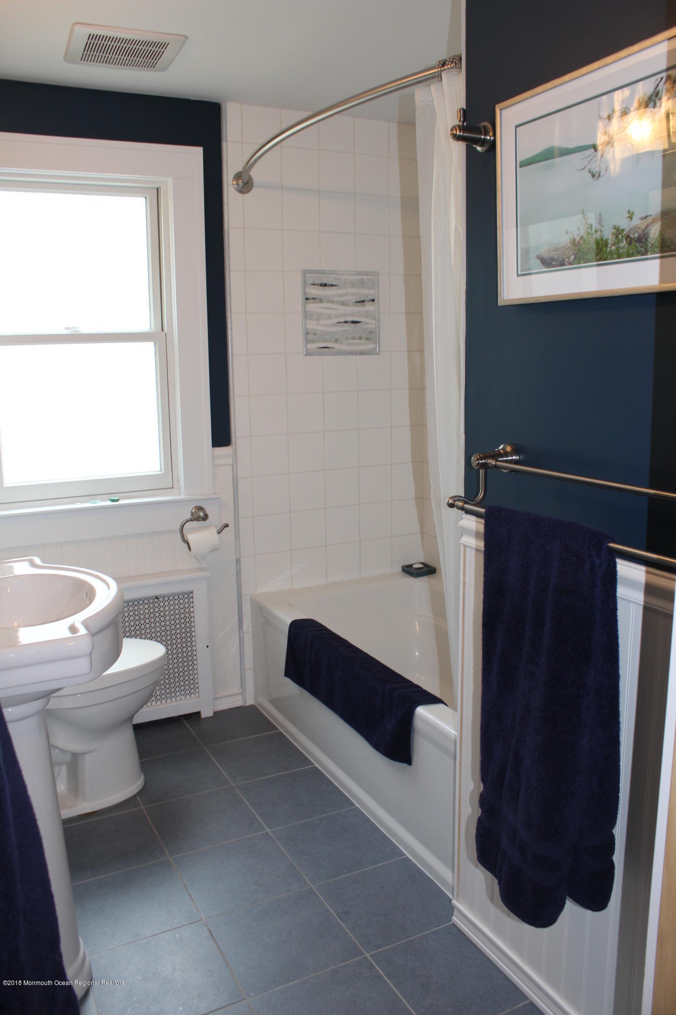 12 Little Silver Point Road Little Silver, NJ 07739 - Photo 18 of 29 a bathroom with a sink and a mirror