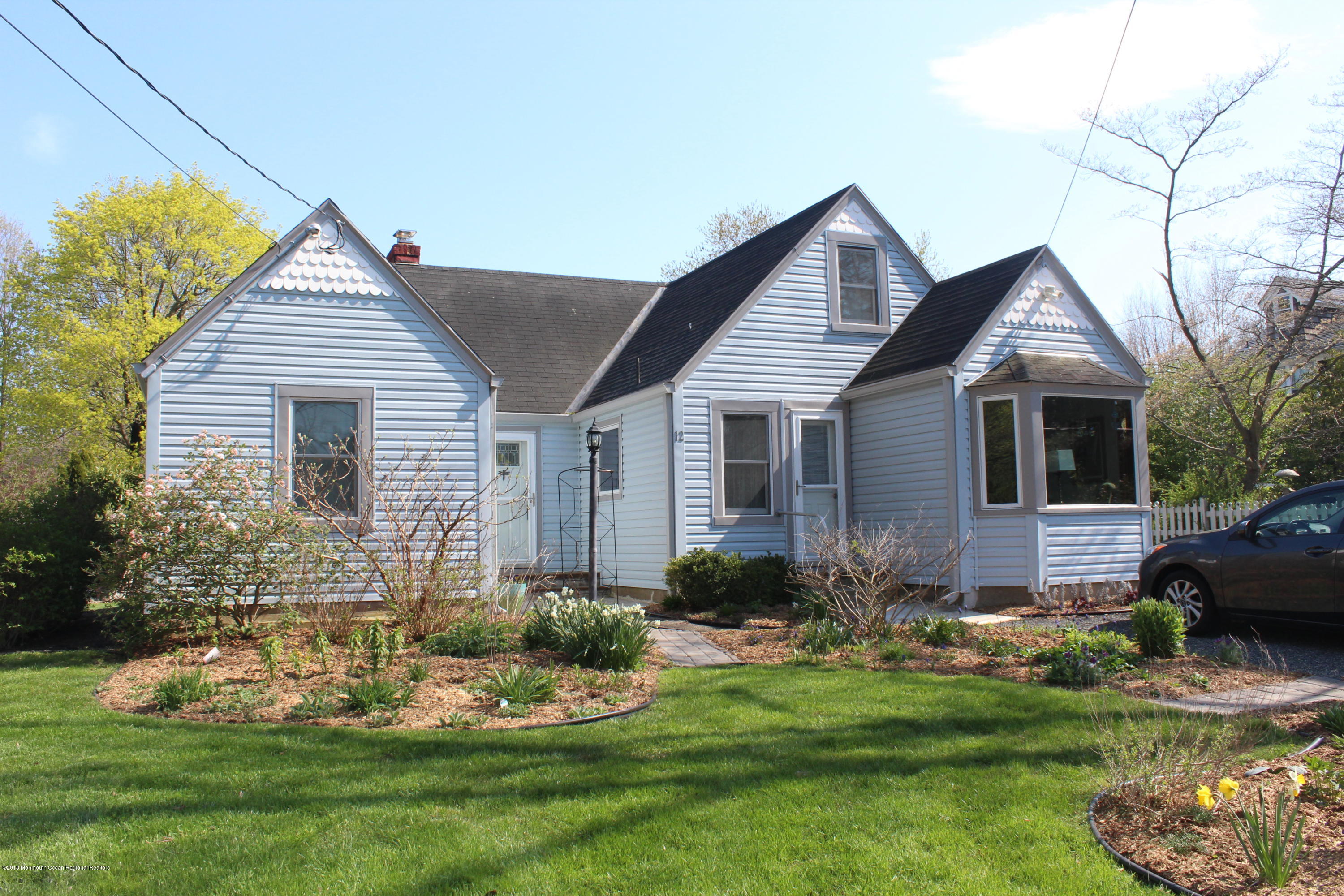 12 Little Silver Point Road Little Silver, NJ 07739 - Photo 29 of 29 a front view of house with yard and green space