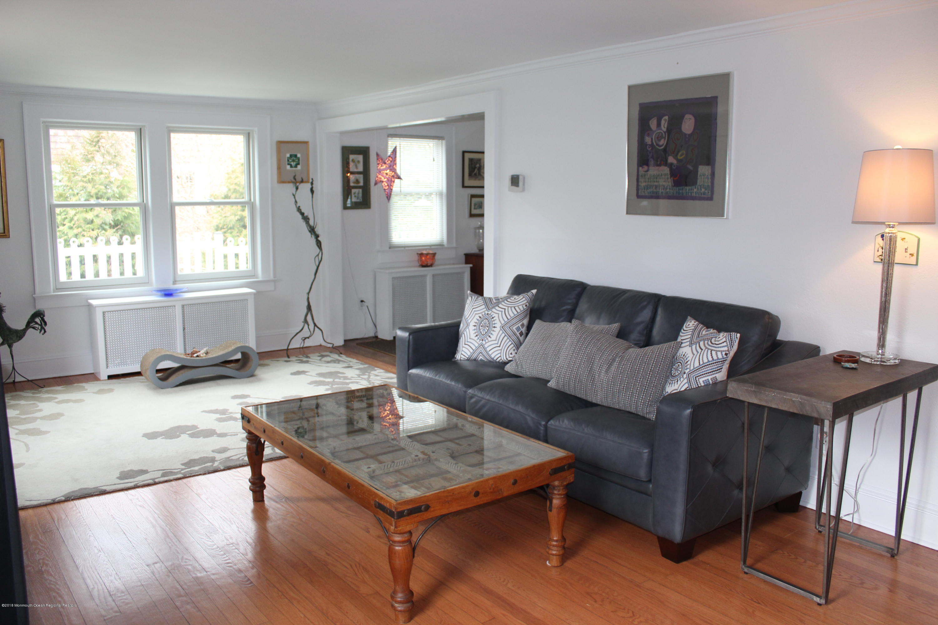12 Little Silver Point Road Little Silver, NJ 07739 - Photo 4 of 29 a living room with furniture and a window