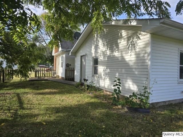 729 Buchanan Street Carthage, IL 62321 - Photo 16 of 16 a backyard of a house with lots of green space