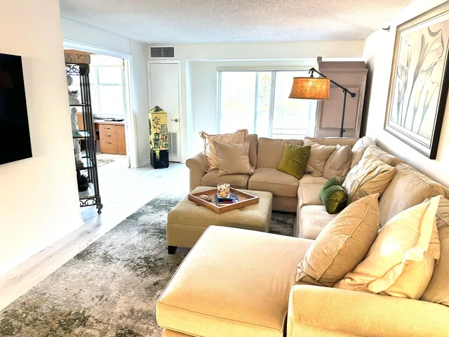 a living room with furniture and a couch