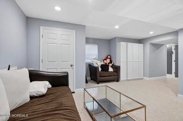 a bedroom with furniture and a couch