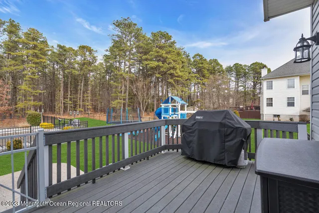 a view of a balcony with furniture