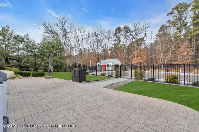 a view of a park with large trees