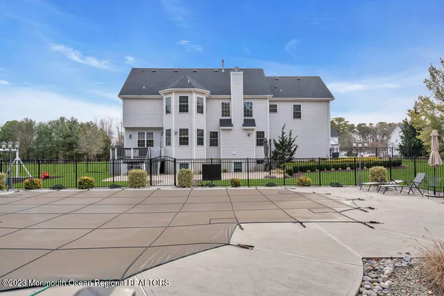 a view of a street with a building in the background