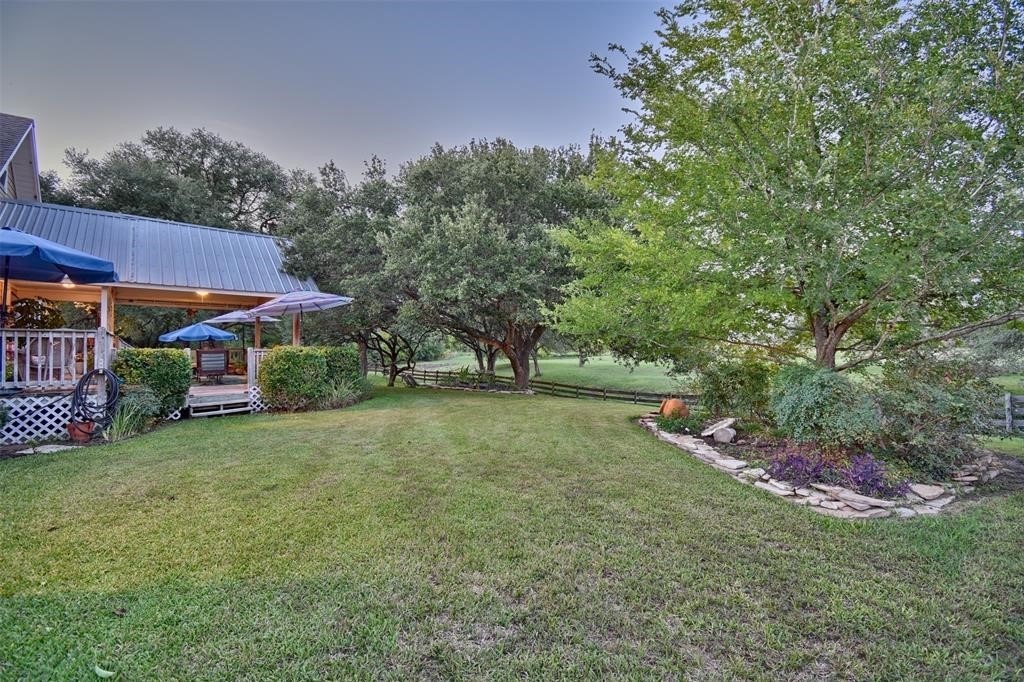 8456 Schuster Road Ledbetter, TX 78946 - Photo 44 of 49 a view of a house with a yard