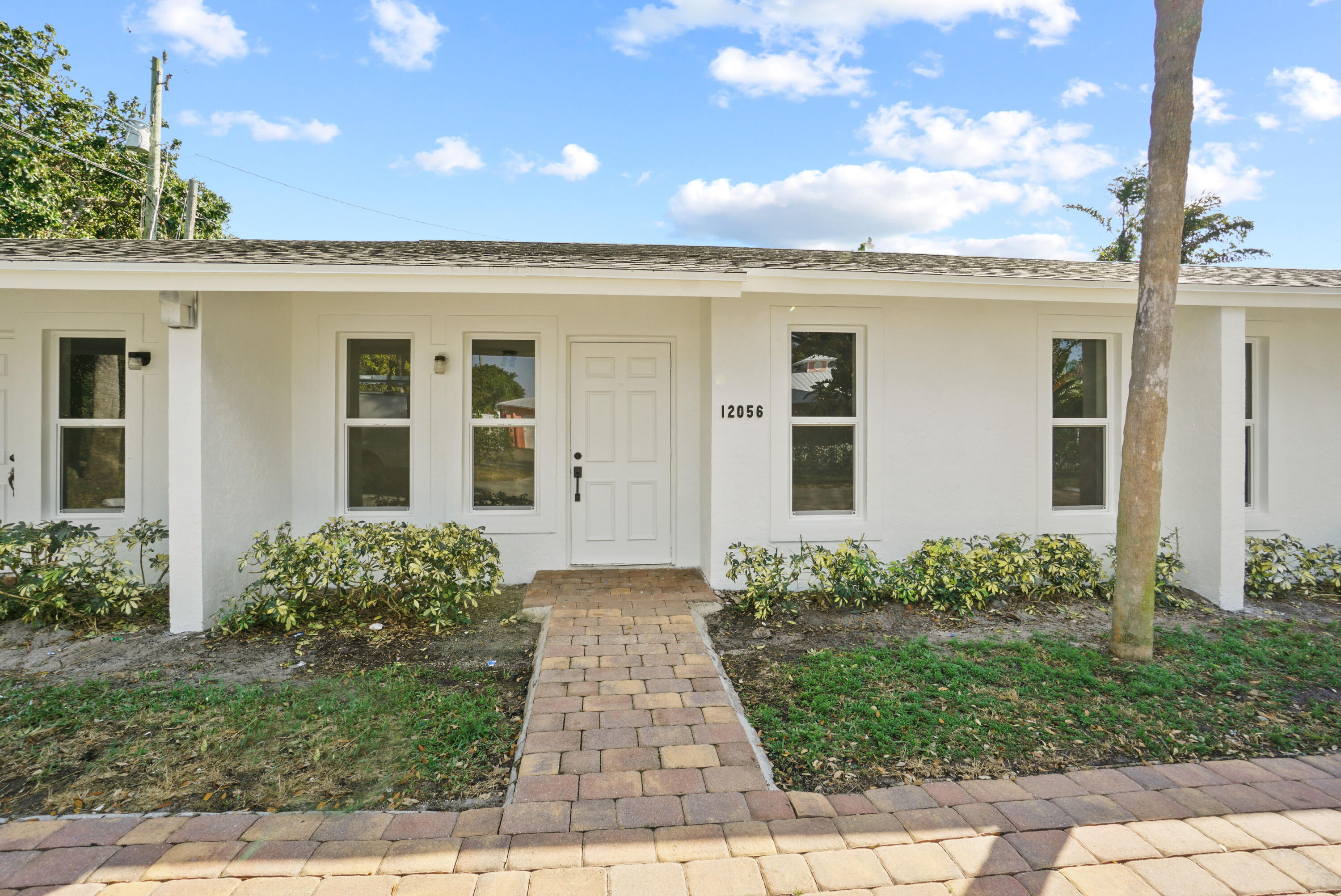 12056 Ellison Wilson Road North Palm Beach, FL 33408 - Photo 1 of 14 12056 Front Exterior
