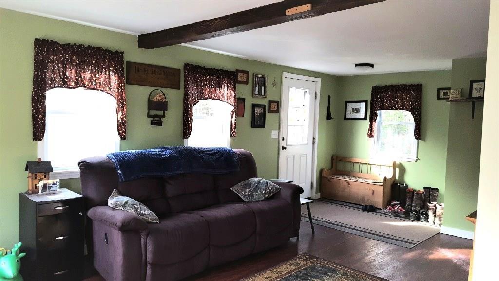 455 Wentworth Road Embden, ME 04958 - Photo 8 of 35 Living room looking at the side door
