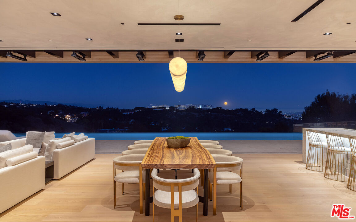 1104 North Tigertail Road Los Angeles, CA 90049 - Photo 20 of 27 a view of swimming pool with seating space