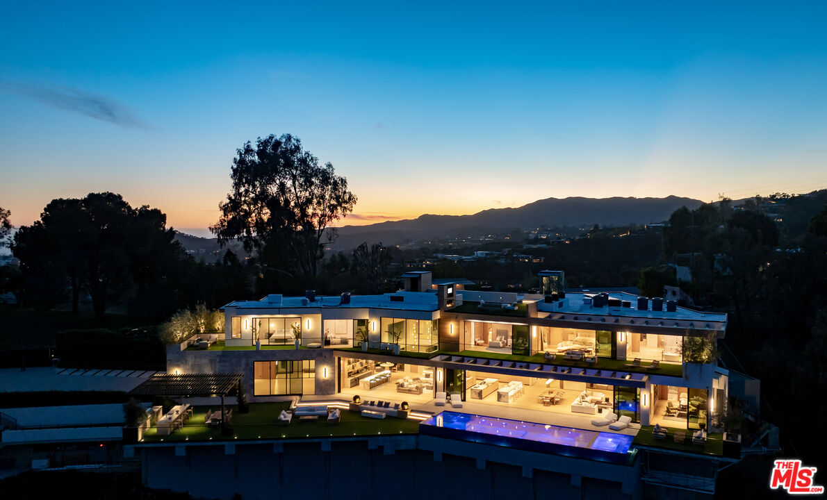 1104 North Tigertail Road Los Angeles, CA 90049 - Photo 27 of 27 a view of swimming pool with a lake view