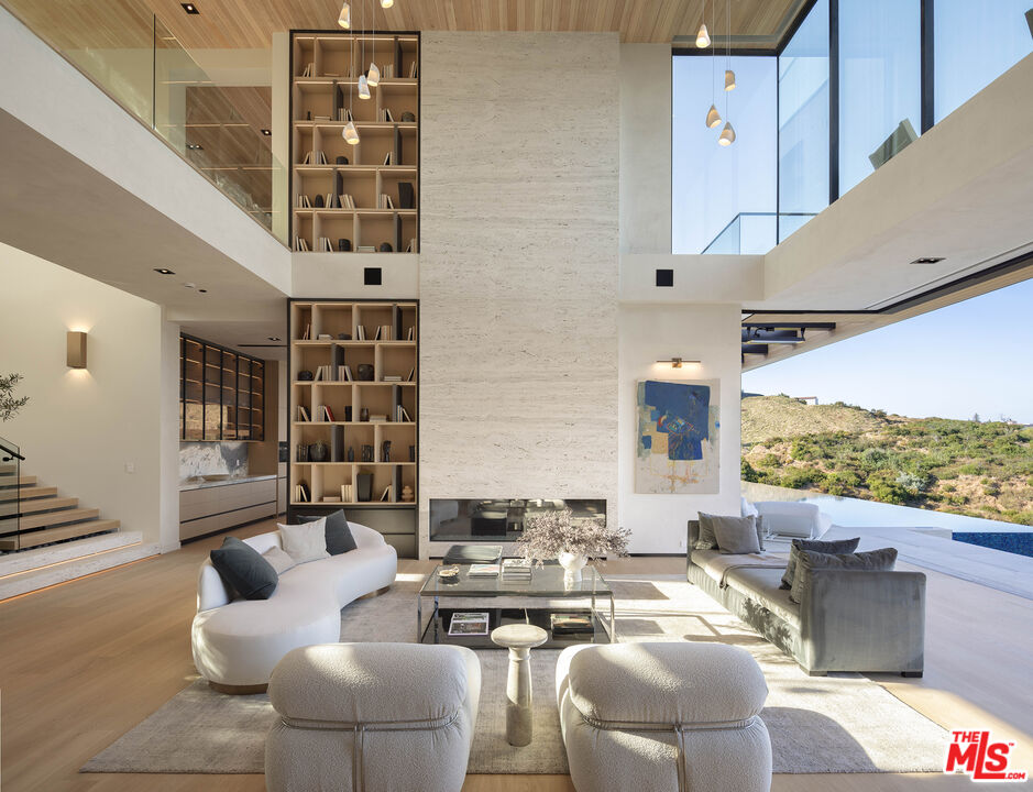 1104 North Tigertail Road Los Angeles, CA 90049 - Photo 5 of 27 a view of a livingroom with furniture and window