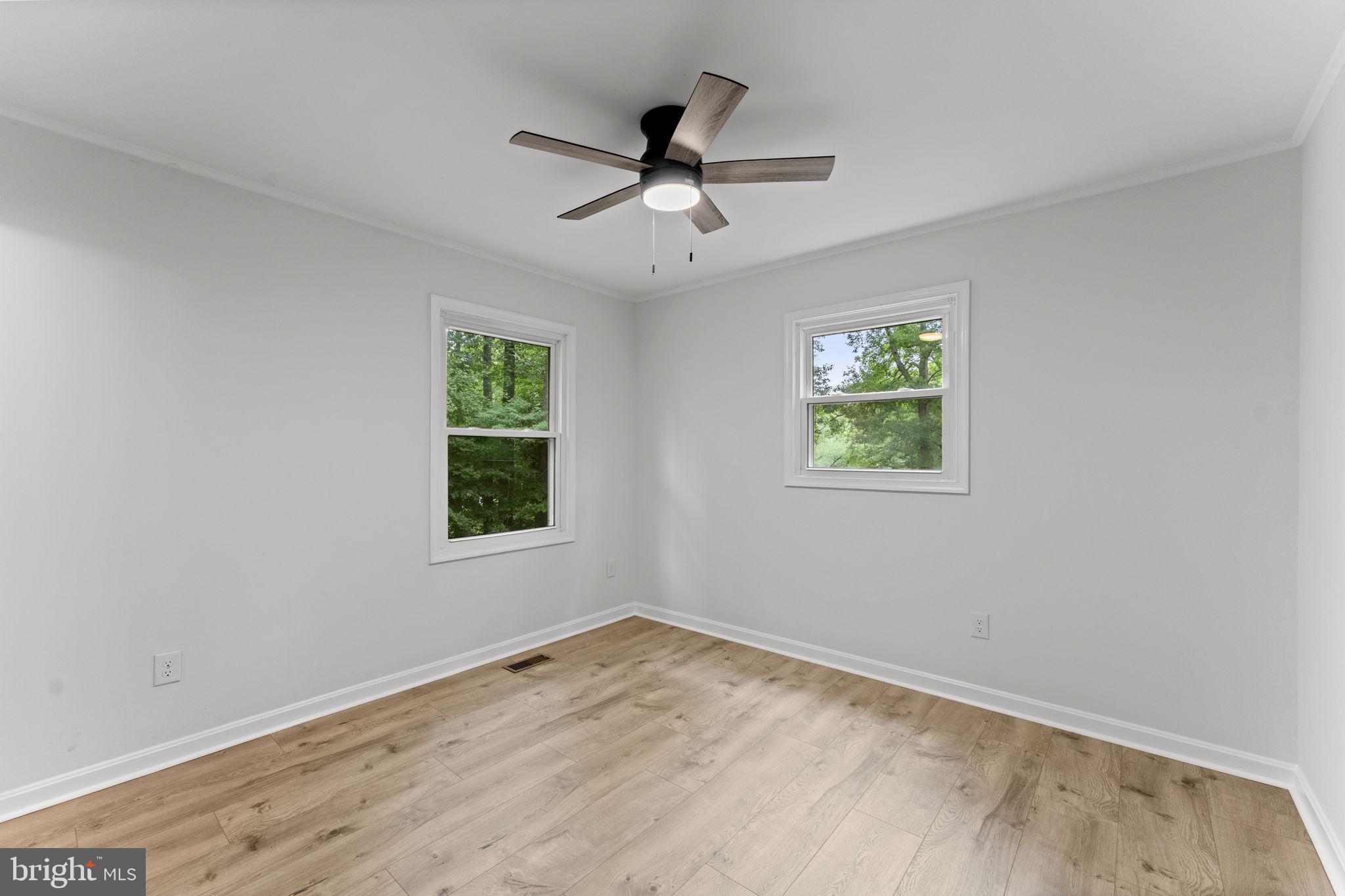 1821 James City Road Reva, VA 22735 - Photo 30 of 44 wooden floor in an empty room with a window