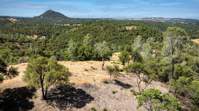 a view of mountain view with mountains in the background