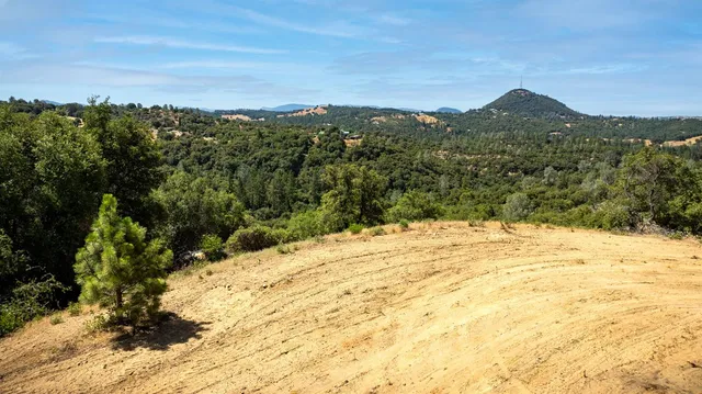 a view of a lake with a mountain in the background