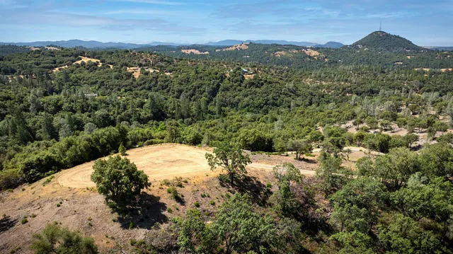 a view of mountain view with mountains in the background