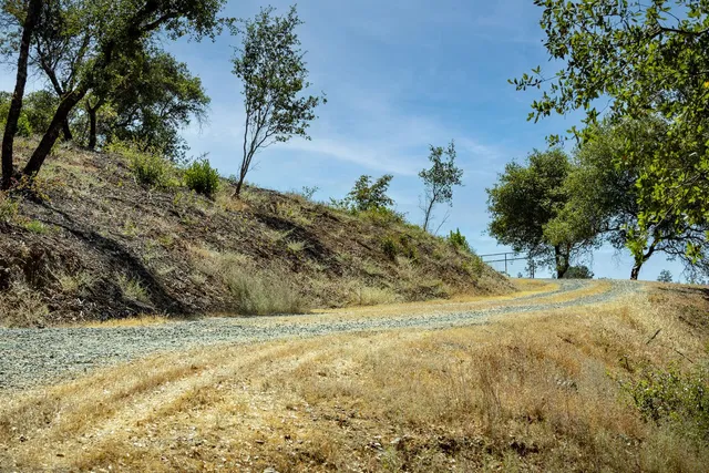 an aerial view of house with yard