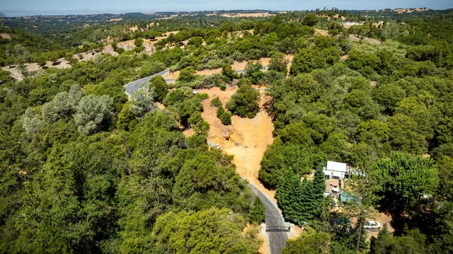 a view of a mountain view with mountains in the background