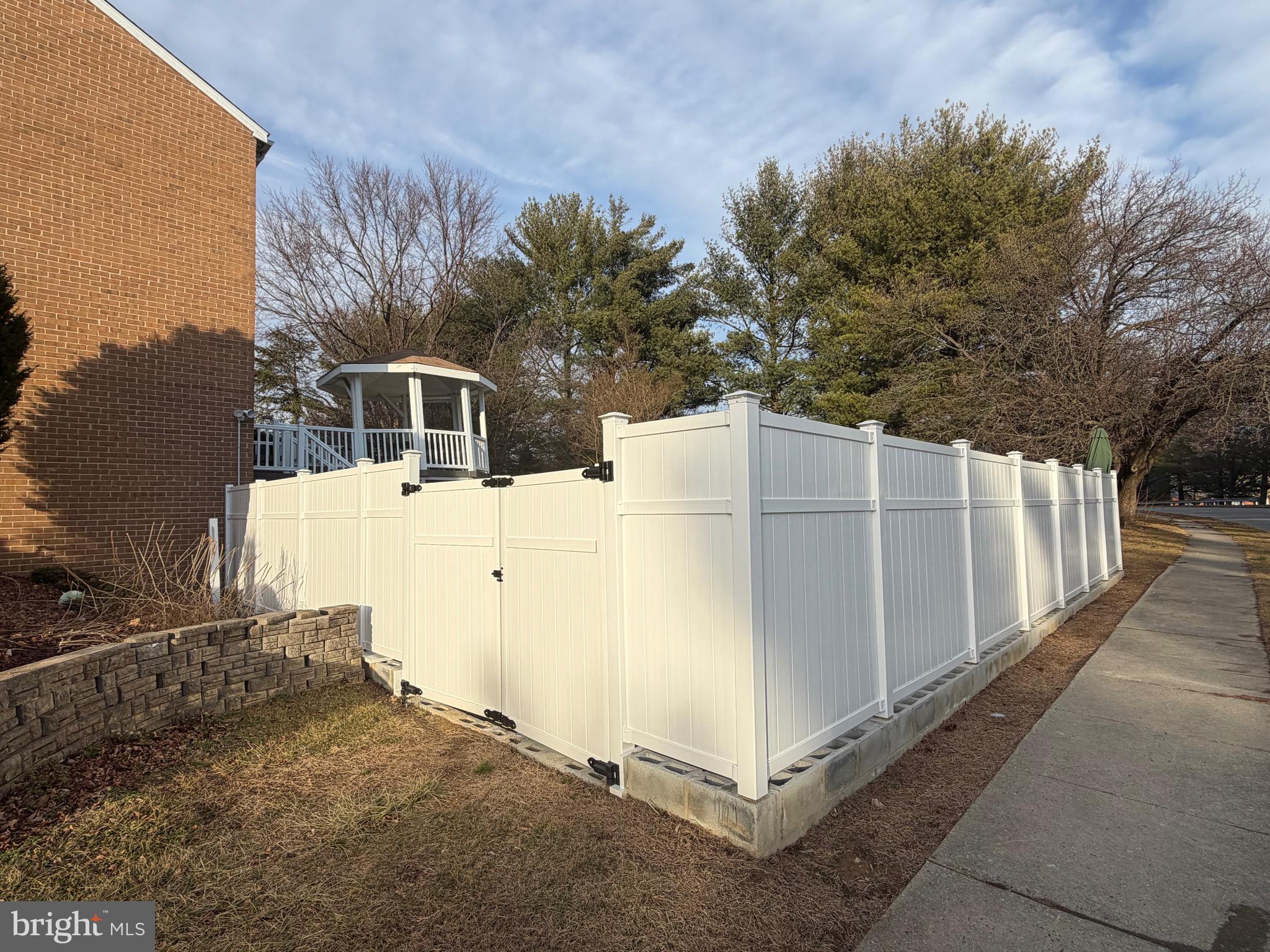 1 Broadleaf Court Baltimore, MD 21234 - Photo 35 of 35 a view of a house with a wooden fence