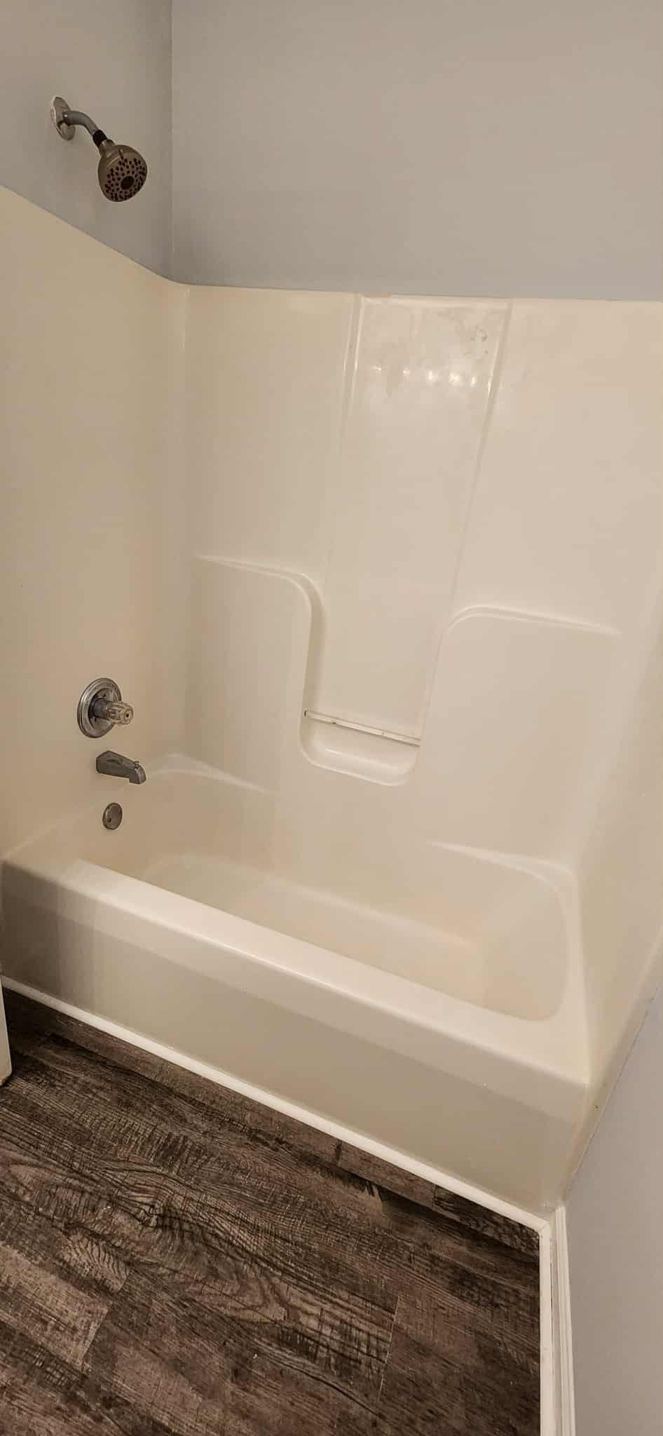 289 Raleigh Drive, Unit B Clarksville, TN 37043 - Photo 19 of 22 a bathroom with a bathtub and a shower