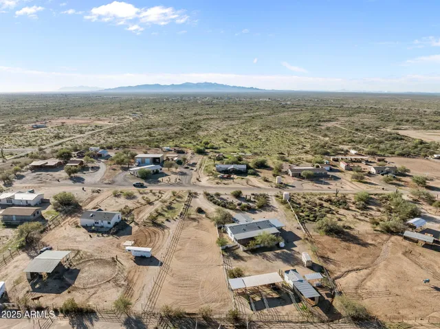 an aerial view of residential building with parking space