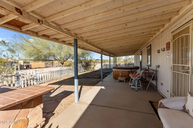a view of a porch with furniture