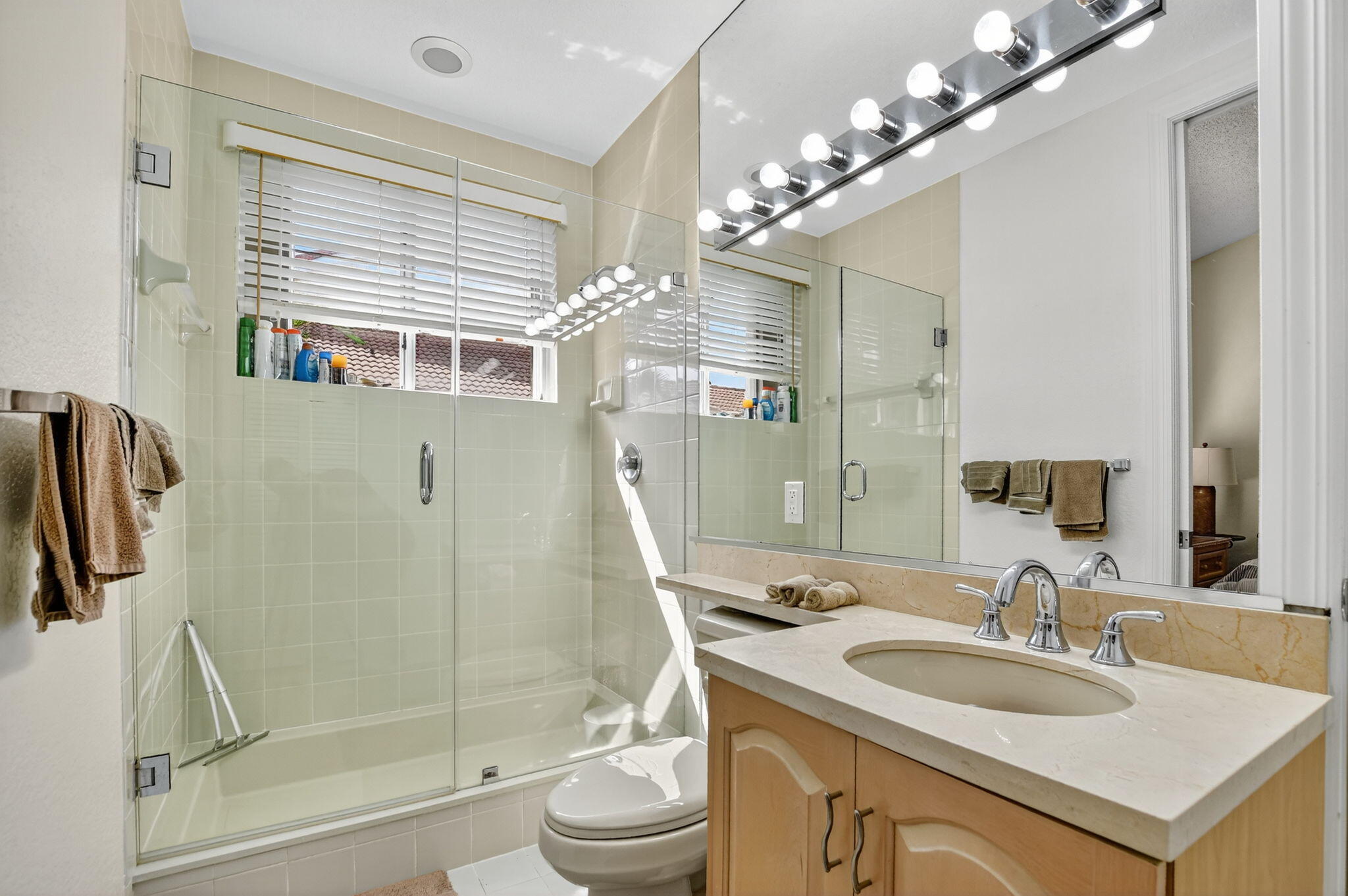 5781 Northwest 24th Avenue, Unit 902 Boca Raton, FL 33496 - Photo 35 of 72 Guest en-suite bath