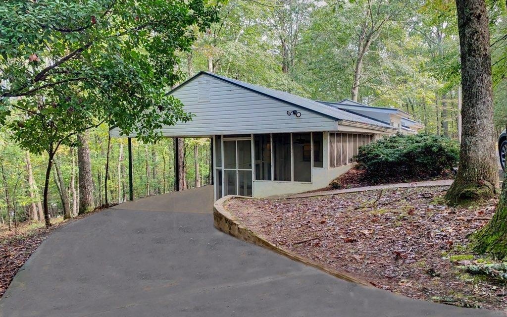 a house with trees in the background