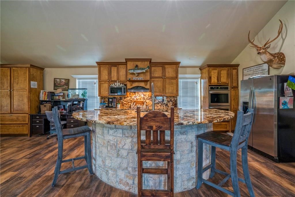 7084 Bartosch Road Robstown, TX 78380 - Photo 12 of 35 a view of a kitchen and dining room