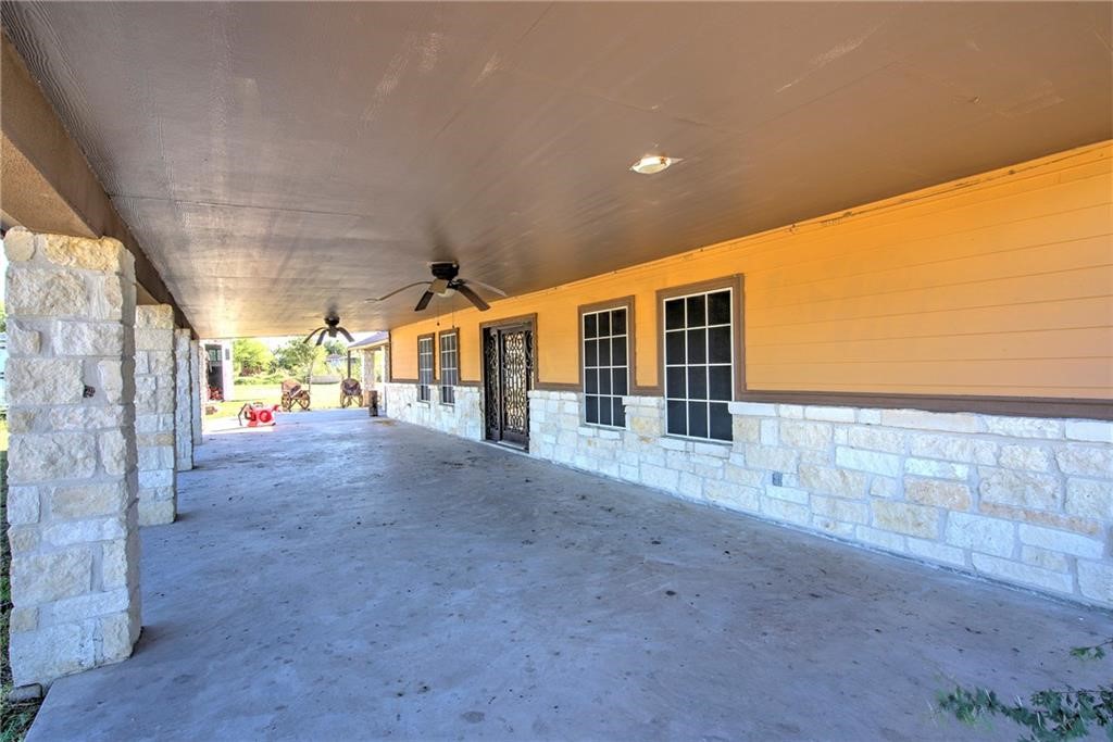 7084 Bartosch Road Robstown, TX 78380 - Photo 3 of 35 a view of a house with a backyard