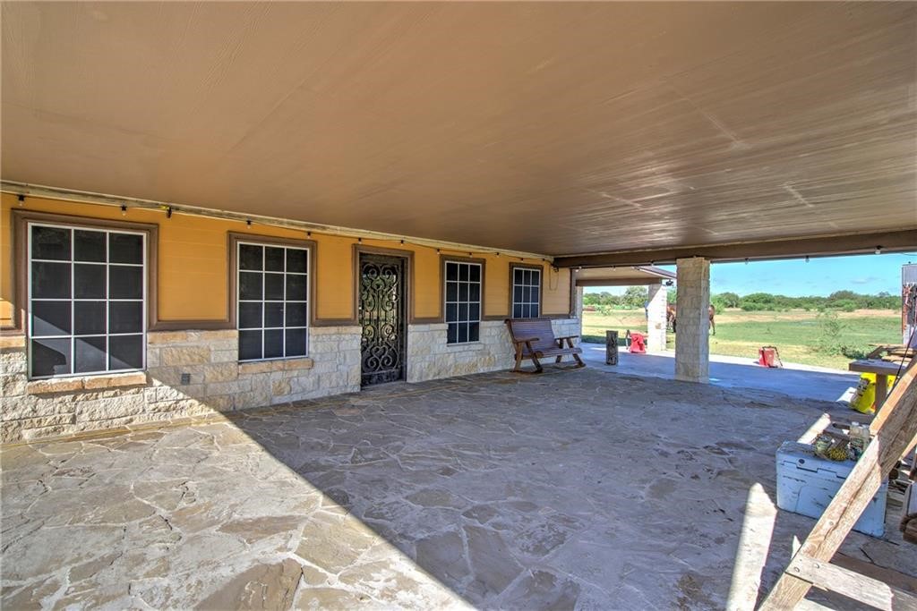 7084 Bartosch Road Robstown, TX 78380 - Photo 4 of 35 a view of a house with backyard and sitting area