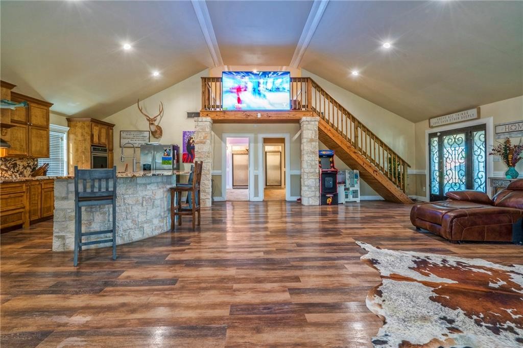 7084 Bartosch Road Robstown, TX 78380 - Photo 6 of 35 a living room with lots of furniture and a wooden floor