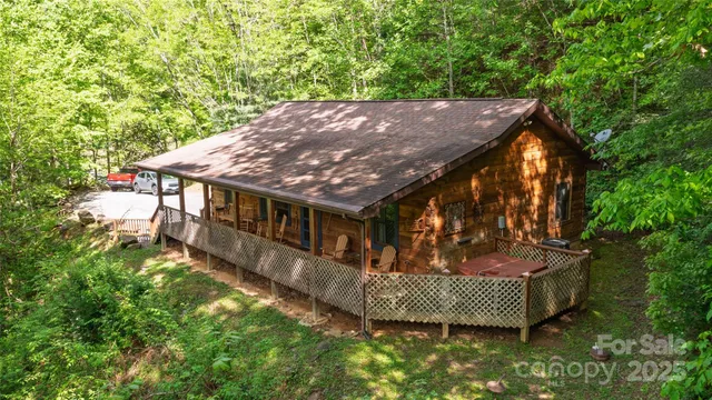 an aerial view of a house having yard patio and backyard