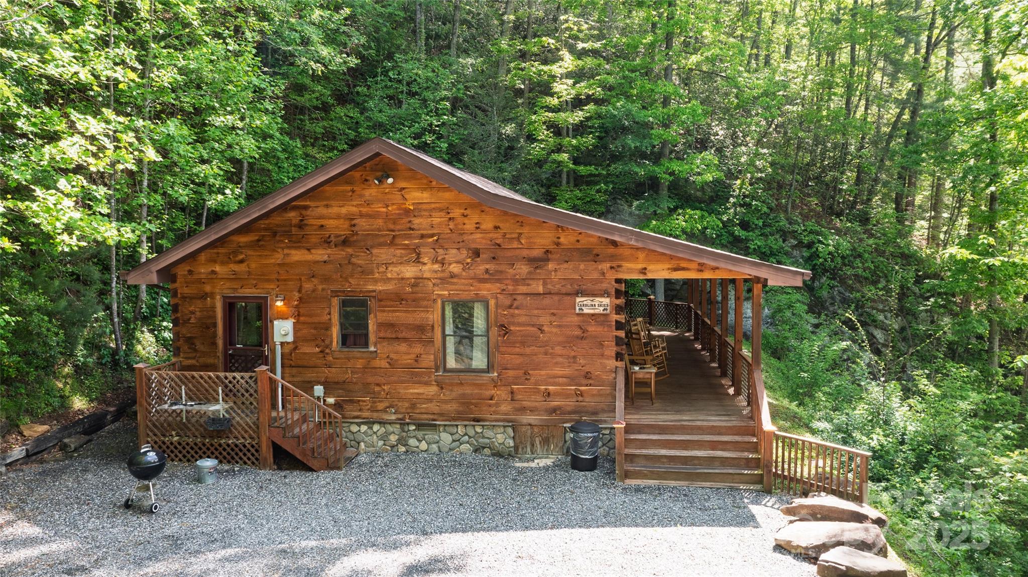 242 Eagles Roost Road Bryson City, NC 28713 - Photo 4 of 33 a view of a house with a yard