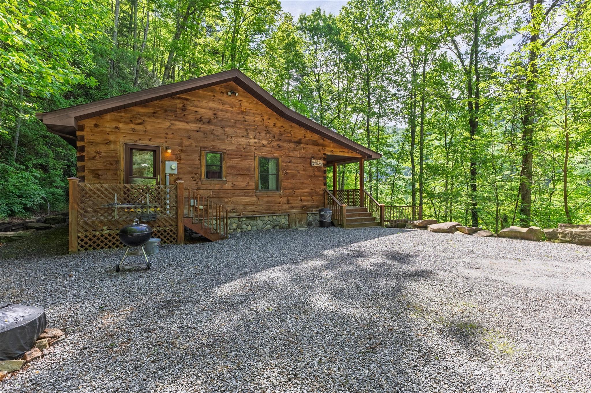 242 Eagles Roost Road Bryson City, NC 28713 - Photo 5 of 33 a view of a house with backyard